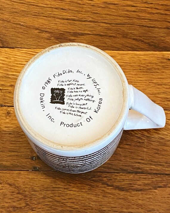 MUG Fido Dido 'L'Humanité Aurait Besoin D'une Bonne Terre' - Céramique 325ml - Noir Et Blanc - Neuf Avec Boîte