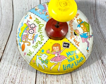 Vintage Chein Juguetes Tin Litho Spinning Top Canciones de cuna Canción de cuna Madre Ganso Mary Cordero Old King Cole Búho Pussy Cat Tom Piper