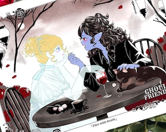 May include: A black and white illustration of two women, one with blue hair and the other with blonde hair, sitting at a table with a glass of wine and a cat. The text "I flirt with death." and "Ghoul Friends" are visible in the image.