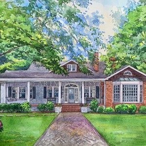 May include: A watercolor painting of a two-story house with a brick facade and a large front porch. The house has a gray roof and white trim. There are trees and bushes in the yard.