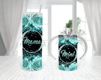 May include: A set of two stainless steel tumblers with a teal floral design and glitter accents. The larger tumbler says "Mama" and the smaller tumbler says "Mini".