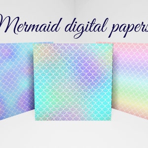 May include: Three digital papers with a mermaid scale pattern in shades of blue, purple, and pink. The papers have a watercolor effect and are displayed against a white background. The text "Mermaid digital papers" is written above.