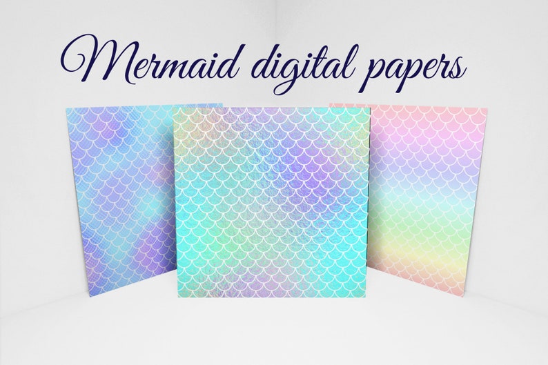 May include: Three digital papers with a mermaid scale pattern in shades of blue, purple, and pink. The papers have a watercolor effect and are displayed against a white background. The text "Mermaid digital papers" is written above.