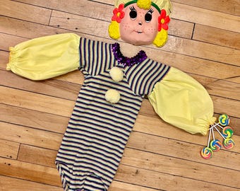 Disfraz de payaso morado y amarillo para niño pequeño