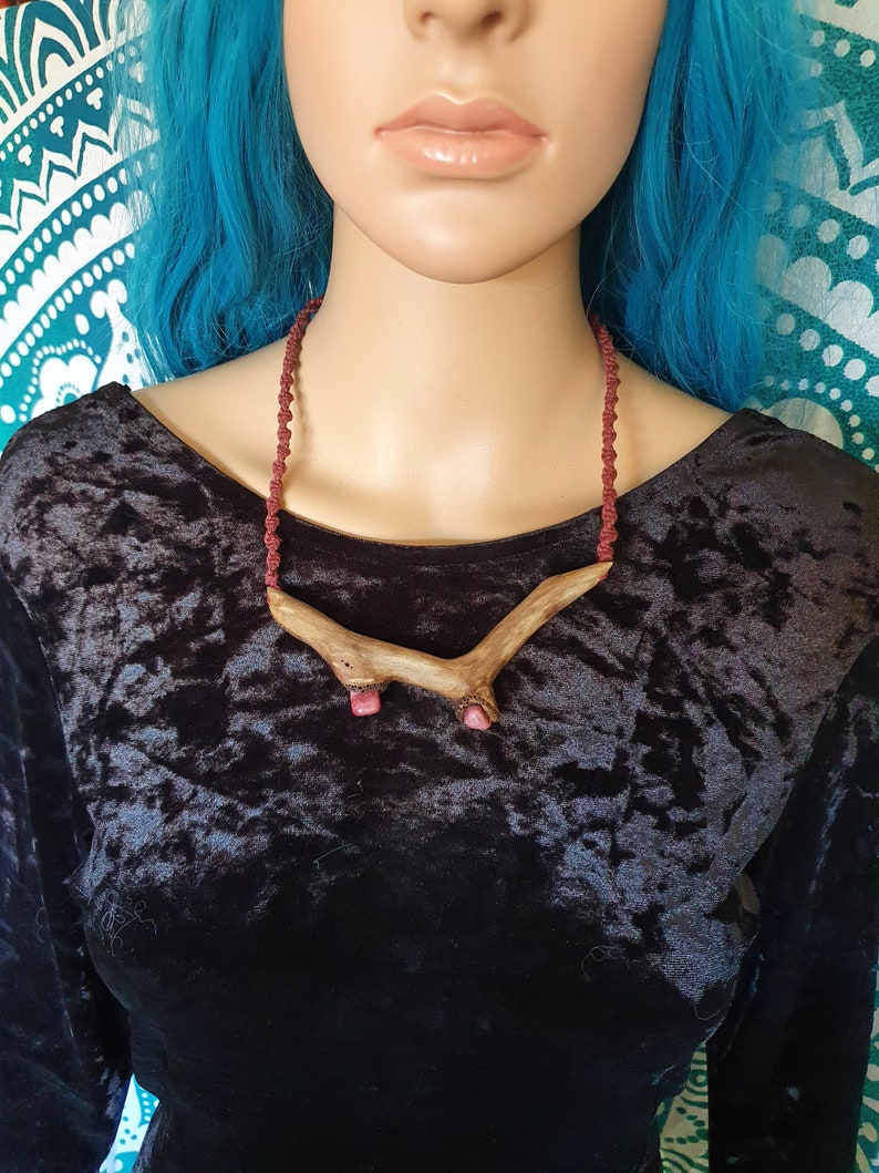 Hand carved wooden necklace with Rhodonite crystals and macrame spiral
