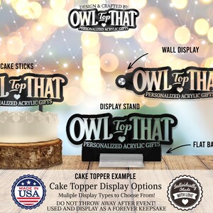 a cake topped with a white frosting frosting on top of a wooden table