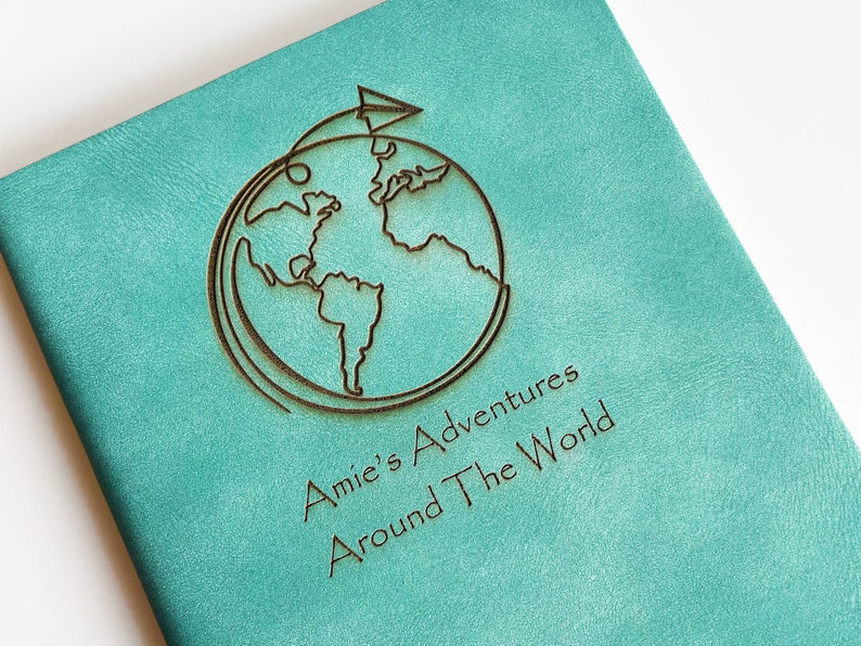 Personalized softcover Travel Journal with Name and world map design that says 'Your name's adventures around the world'