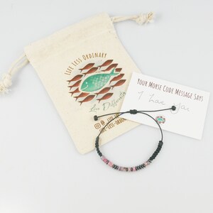 Above image of personalised Morse code bracelet with hemp gift bag and message card.