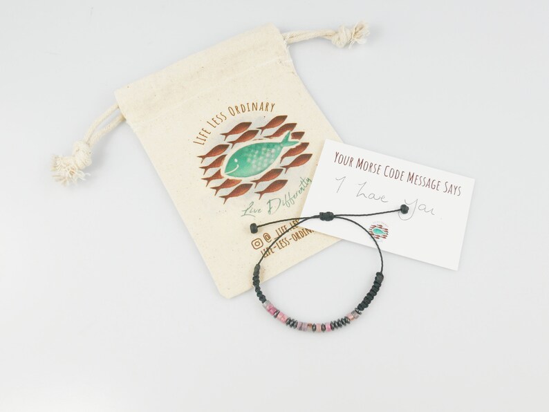 Above image of personalised Morse code bracelet with hemp gift bag and message card.