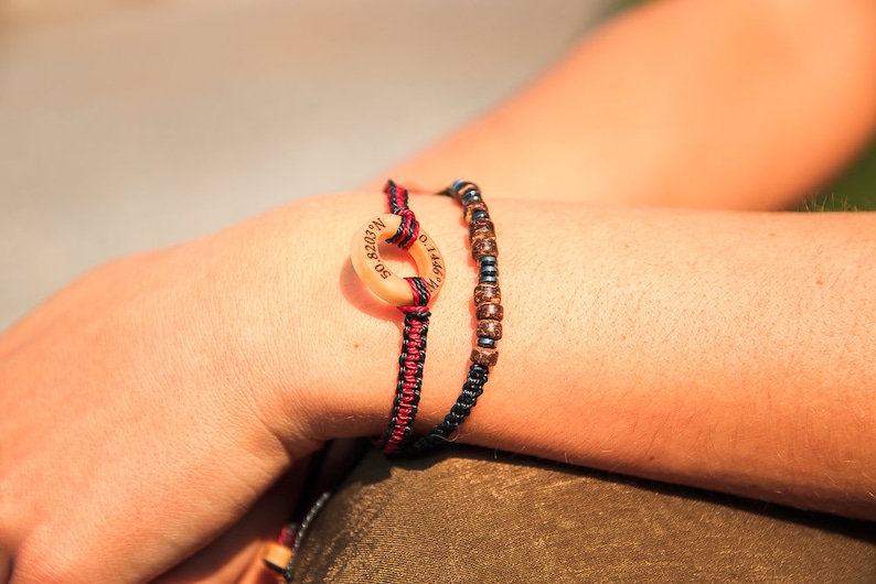 Shown on models wrist, Unisex customised Morse code bracelet made with metal and wooden beads, also pictured our Co-ordinate customised bracelet.