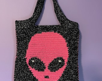 Bolsa extraterrestre rosa