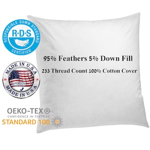 May include: White pillow with a 95% feather and 5% down fill. The pillow has a 233 thread count 100% cotton cover. The pillow is certified by the Responsible Down Standard (RDS) and OEKO-TEX Standard 100.