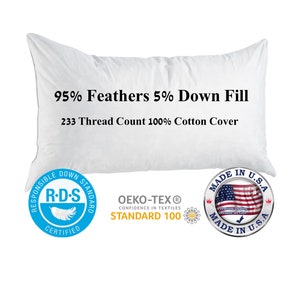 May include: White pillow with a 95% feather and 5% down fill. The pillow has a 233 thread count 100% cotton cover. The pillow is certified by the Responsible Down Standard (RDS) and OEKO-TEX Standard 100. The pillow is made in the USA.