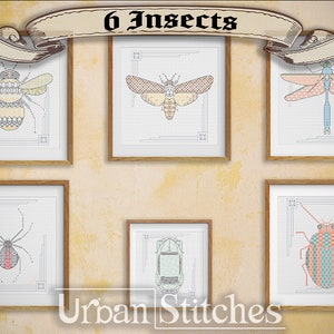May include: Six framed cross-stitch patterns of insects, including a bee, moth, dragonfly, spider, beetle, and a Volkswagen Beetle. The frames are all wooden and have a light brown finish. The title "6 Insects" is displayed above the frames, and the text "Urban Stitches" is displayed below the frames.