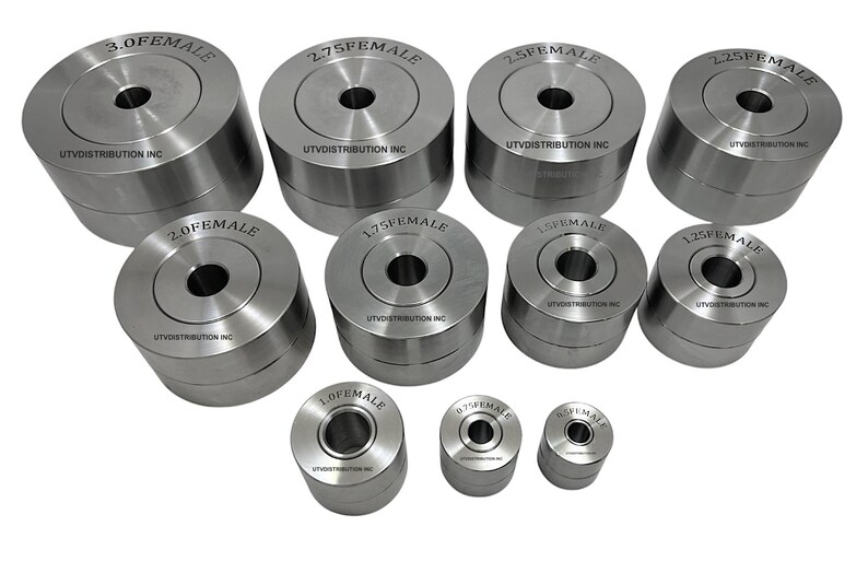 May include: A set of ten silver metal die sets in various sizes, labeled with their size and "FEMALE". The die sets are arranged in a semi-circle on a white background.