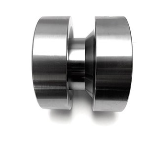 May include: A silver metal roller with a smooth, cylindrical shape. The roller has a slightly smaller diameter in the middle, creating a slight hourglass shape.