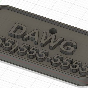 May include: A black plastic tag with the text "DAWG (555) 555-5555" embossed on it.