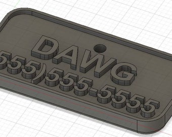 May include: A black plastic tag with the text "DAWG (555) 555-5555" embossed on it.