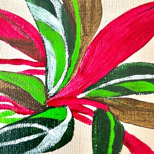 May include: A painting of a stylized flower with green, white, brown, and pink leaves on a beige canvas.