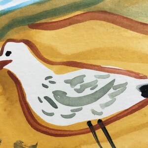 May include: A watercolor painting of a white bird with brown and black markings on a yellow background.