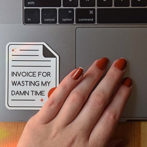 An invoice-shaped die cut sticker that reads invoice for wasting my damn time. It's a perfect coworker gift.