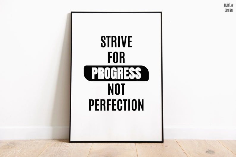 May include: Black and white motivational poster with the text "STRIVE FOR PROGRESS NOT PERFECTION" on a white background.