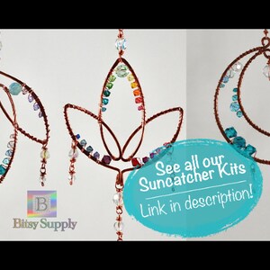 May include: Three copper wire suncatchers with colorful beads and crystals. The suncatchers are shaped like a leaf, a lotus flower, and a crescent moon. The text "See all our Suncatcher Kits Link in description!" is written in white on a blue background.