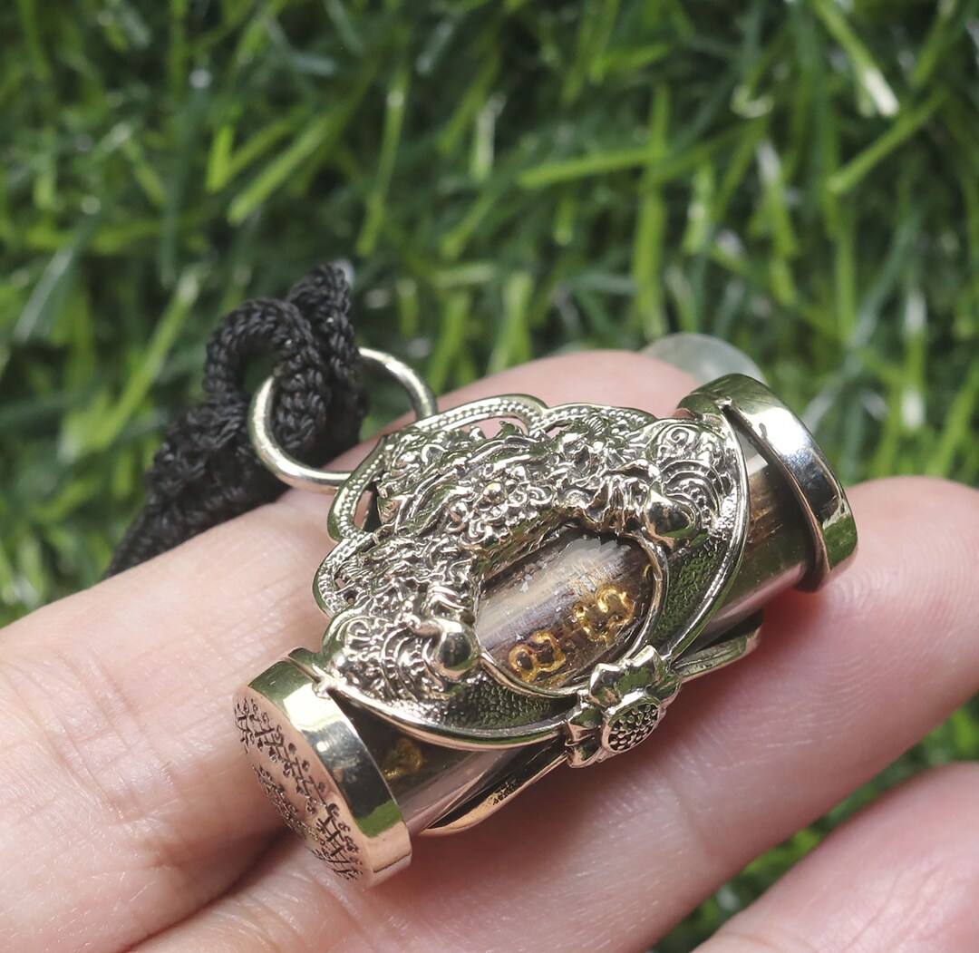 Thai Blessing Co Takrut - Protective Thai Wealth Amulet main image 0