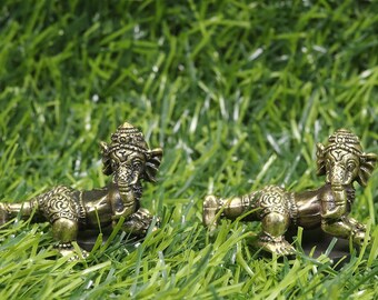 Mosiężna figurka Ganesha: tajski amulet, dar hinduskiego boga