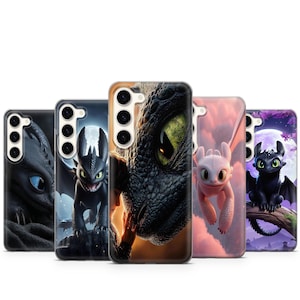 May include: A collection of five phone cases featuring dragon designs. The cases showcase various dragons in different colors and poses, including a close-up of a dragon's eye and a dragon in flight.