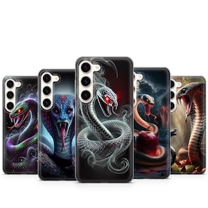 Peut inclure: Un ensemble de trois bols gigognes en céramique de tailles graduées. Les bols sont blancs avec un motif floral bleu et un bord festonné. Le plus grand bol mesure environ 20 cm de diamètre.