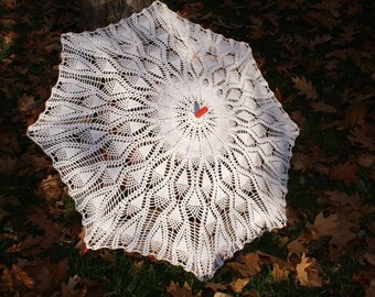 White crochet lace umbrella. Photo session accesory