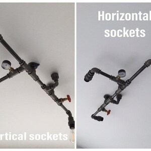 May include: Industrial style ceiling light fixture with four light bulbs and exposed pipes. The fixture has two vertical sockets and two horizontal sockets. The text "Horizontal sockets" and "Vertical sockets" is visible in the image.