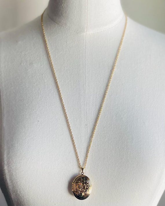 Avon NIB Gold Tone Locket - image 1