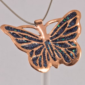 Hammered copper butterfly pendant