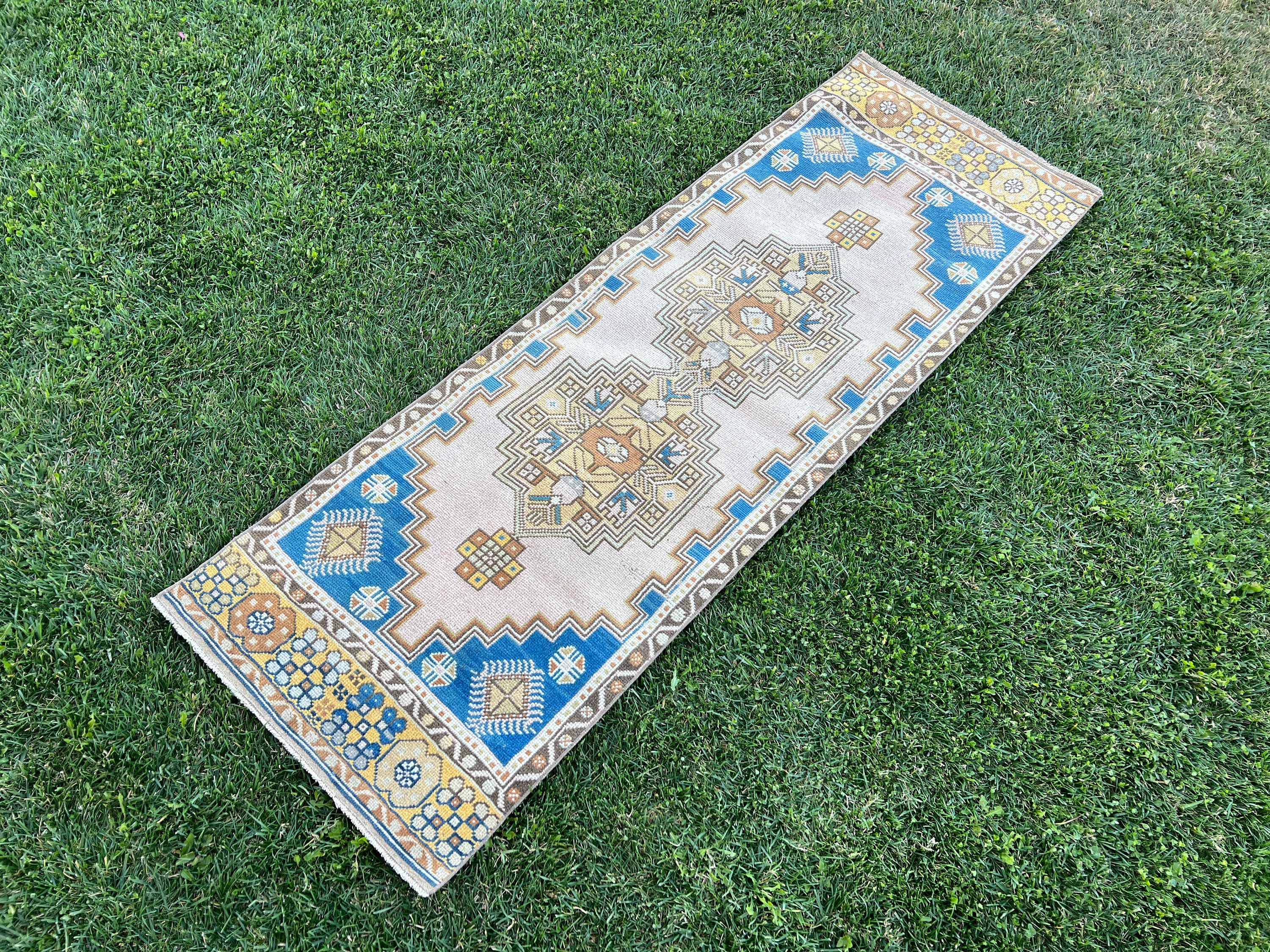 Tapis oushak bleu, Tapis