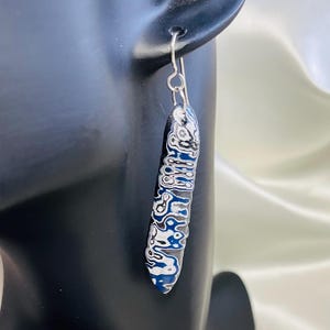 Stunning fordite and sterling silver earrings.