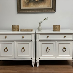 SOLD        Henredon mid century traditional nightstands in white lacquer