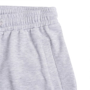 stacked gray sweats