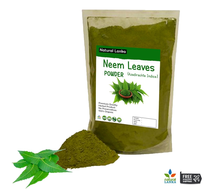 May include: A bag of green Neem Leaves Powder, labeled "Natural Lanka Neem Leaves Powder (Azadirachta Indica)". The bag is on a white background with a small pile of powder in front of it. The label also states "Premium Quality Herbal Product, No Preservatives, 100% Organic".