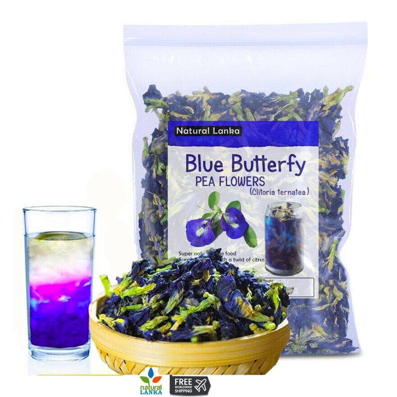 May include: A bag of dried blue butterfly pea flowers, also known as Clitoria ternatea, with a glass of blue butterfly pea flower tea. The bag has a label that says "Natural Lanka Blue Butterfly Pea Flowers (Clitoria ternatea)".
