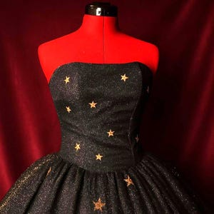 Starry fantasy ball gown with hand-stitched star embroidery and glitter tulle skirt