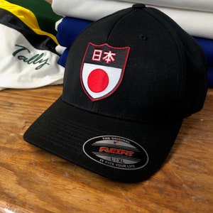 Black FlexFit Hat with a Japan Embroidered Twill Crest
