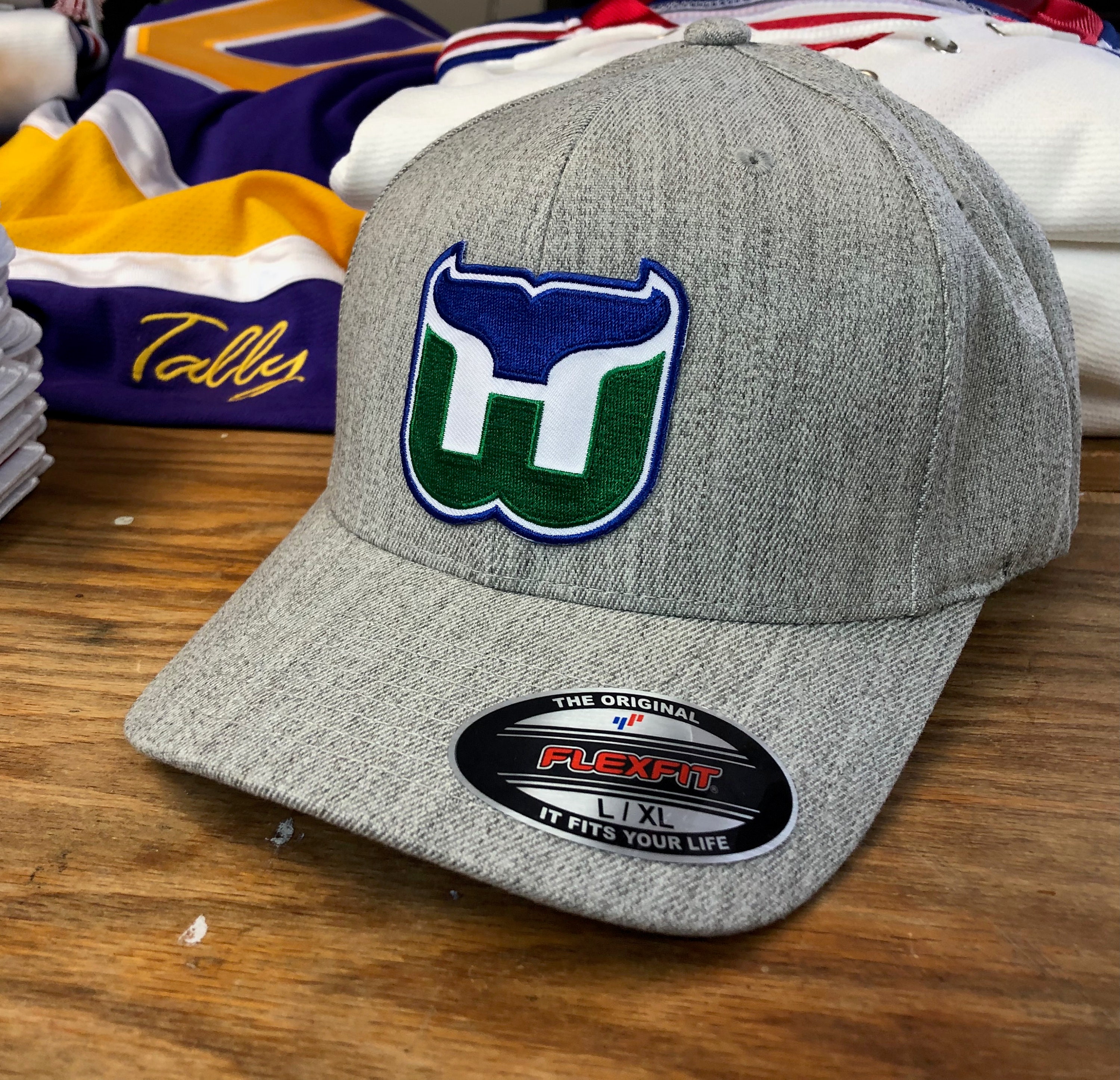 White and Blue Hockey Jerseys with the Whalers Embroidered Twill