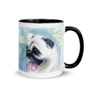 May include: White ceramic mug with a black rim and handle. The mug features a watercolor painting of a pug with a light blue background.
