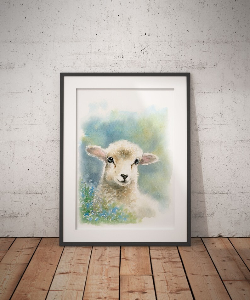 May include: A watercolor painting of a white lamb with blue flowers in the background. The lamb is looking directly at the viewer with its head tilted slightly to the side.