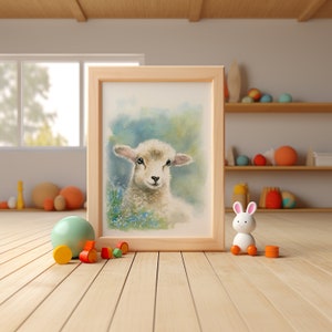 May include: A watercolor painting of a white lamb with a light blue background. The lamb is looking at the viewer with its head tilted slightly to the side. The painting is framed in a light wood frame.