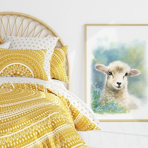 May include: A white bed with a yellow and white patterned duvet cover and pillows. The bed has a wicker headboard. A framed watercolor painting of a white lamb with blue flowers is on the wall behind the bed.
