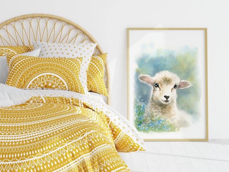 May include: A white bed with a yellow and white patterned duvet cover and pillows. The bed has a wicker headboard. A framed watercolor painting of a white lamb with blue flowers is on the wall behind the bed.