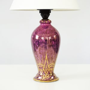 Vintage mid century ceramic table lamp with a beautiful purple glaze and hand painted gold decor. 1950s.